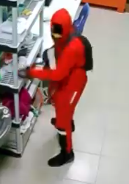 Suspect with face covered