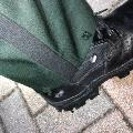 Deputy's boot with bullet hole